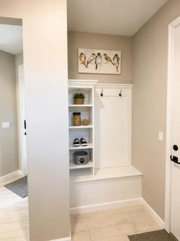 Custom built in Storage area as you enter into the garage