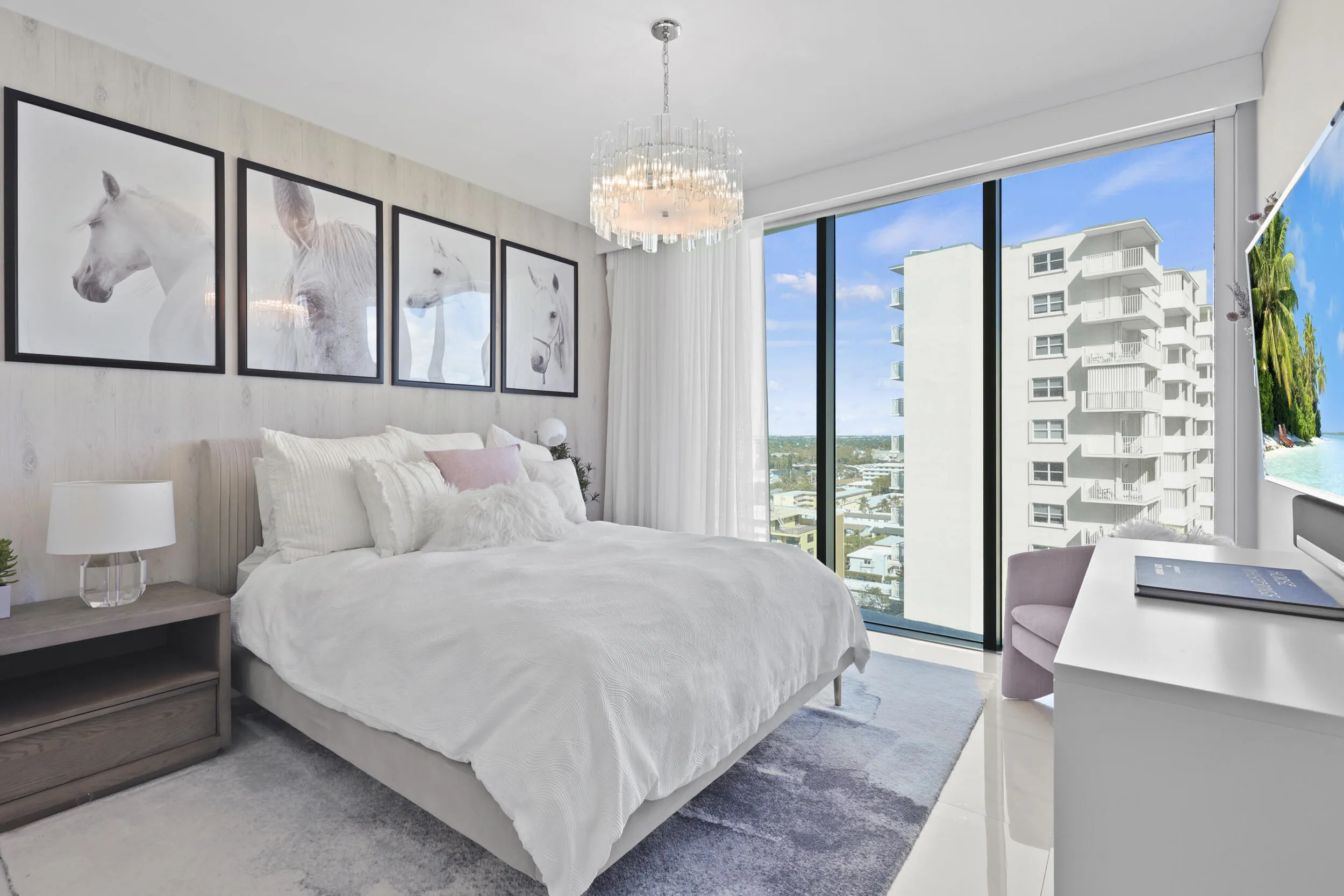 Guest bedroom 1 features more designer touches, automated shades & blinds, customized closet, and ensuite bathroom.