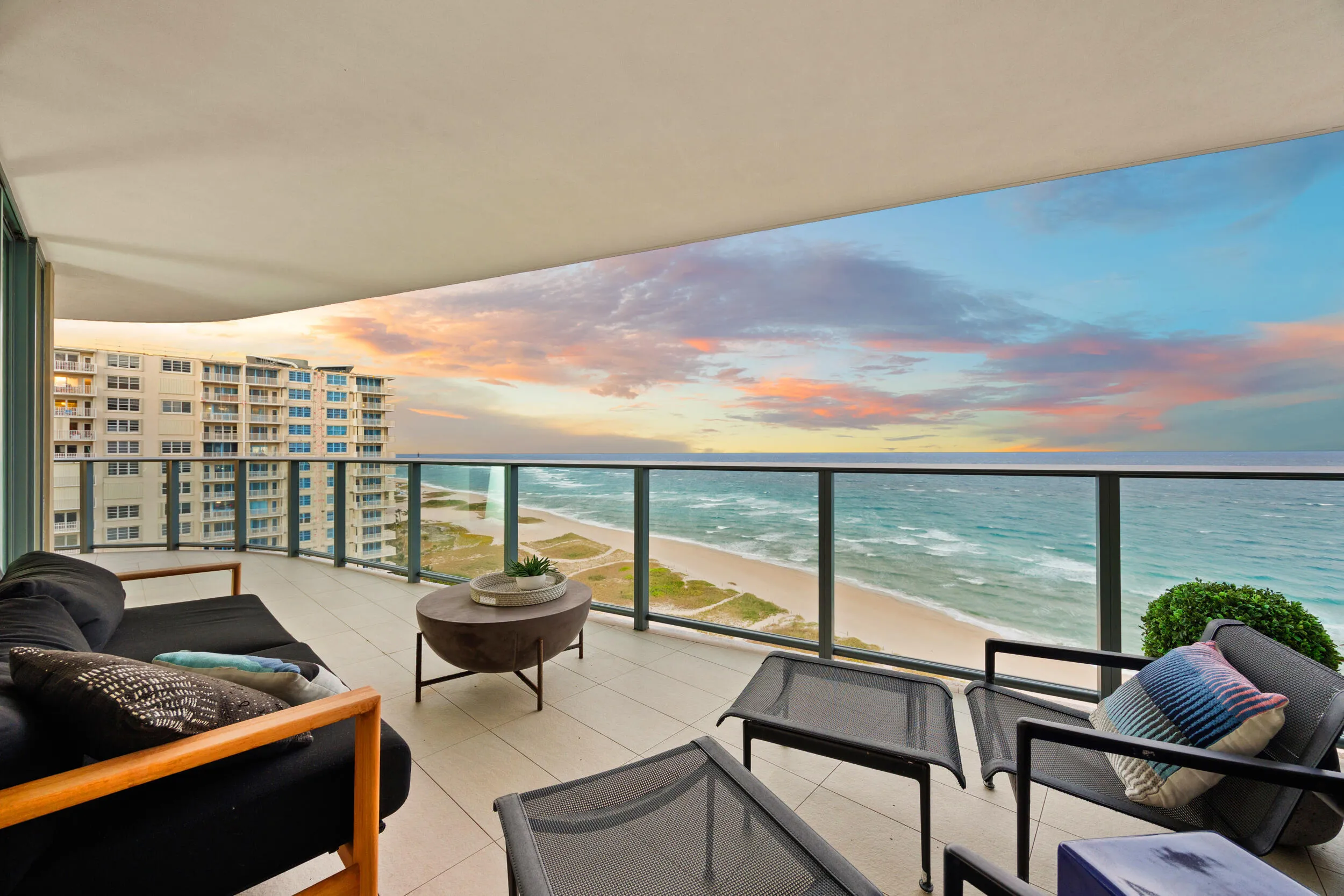 The expansive wraparound balcony offers an exceptional amount of outdoor living space and a peaceful setting to unwind with family and friends. As evening falls, enjoy colorful sunsets over the Intracoastal while the Atlantic fades into twilight and ocean breezes move gently through the air.