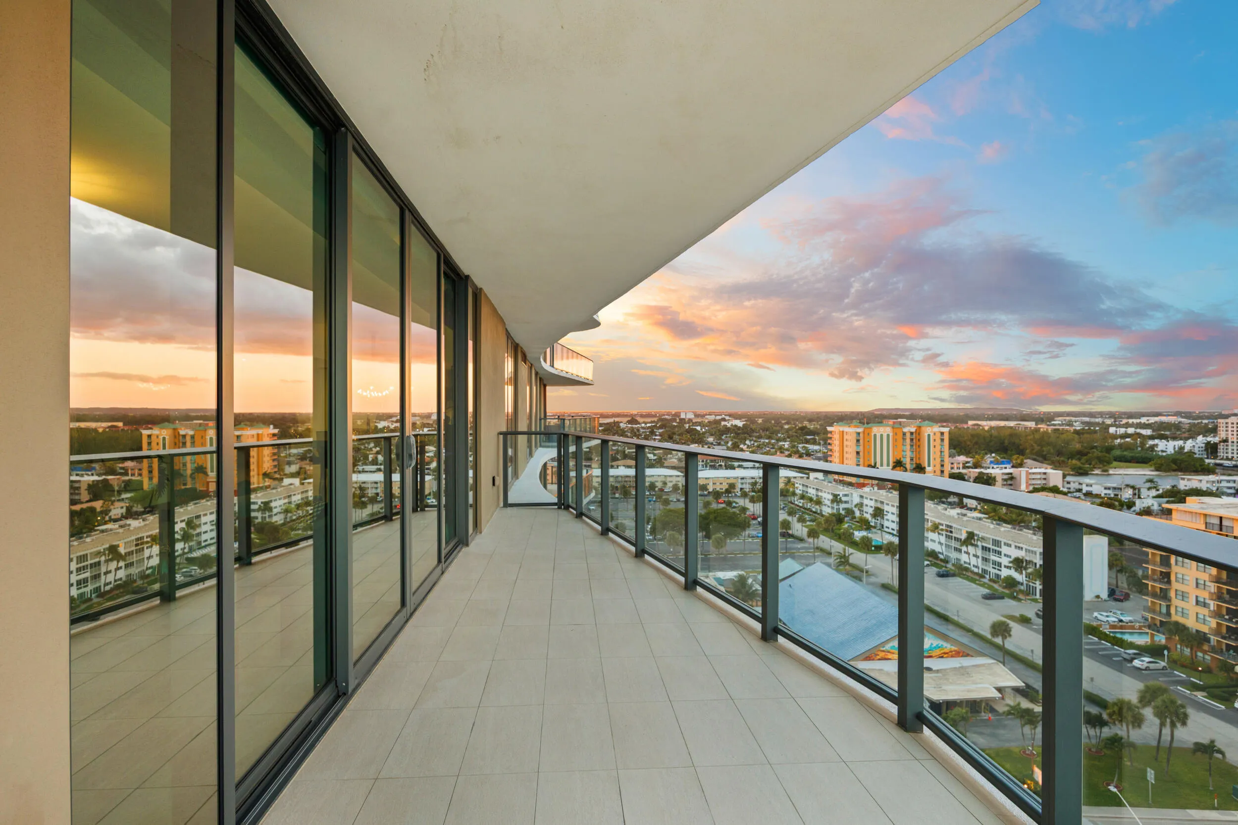 The expansive wraparound balcony offers an exceptional amount of outdoor living space and a peaceful setting to unwind with family and friends. As evening falls, enjoy colorful sunsets over the Intracoastal while the Atlantic fades into twilight and ocean breezes move gently through the air.
