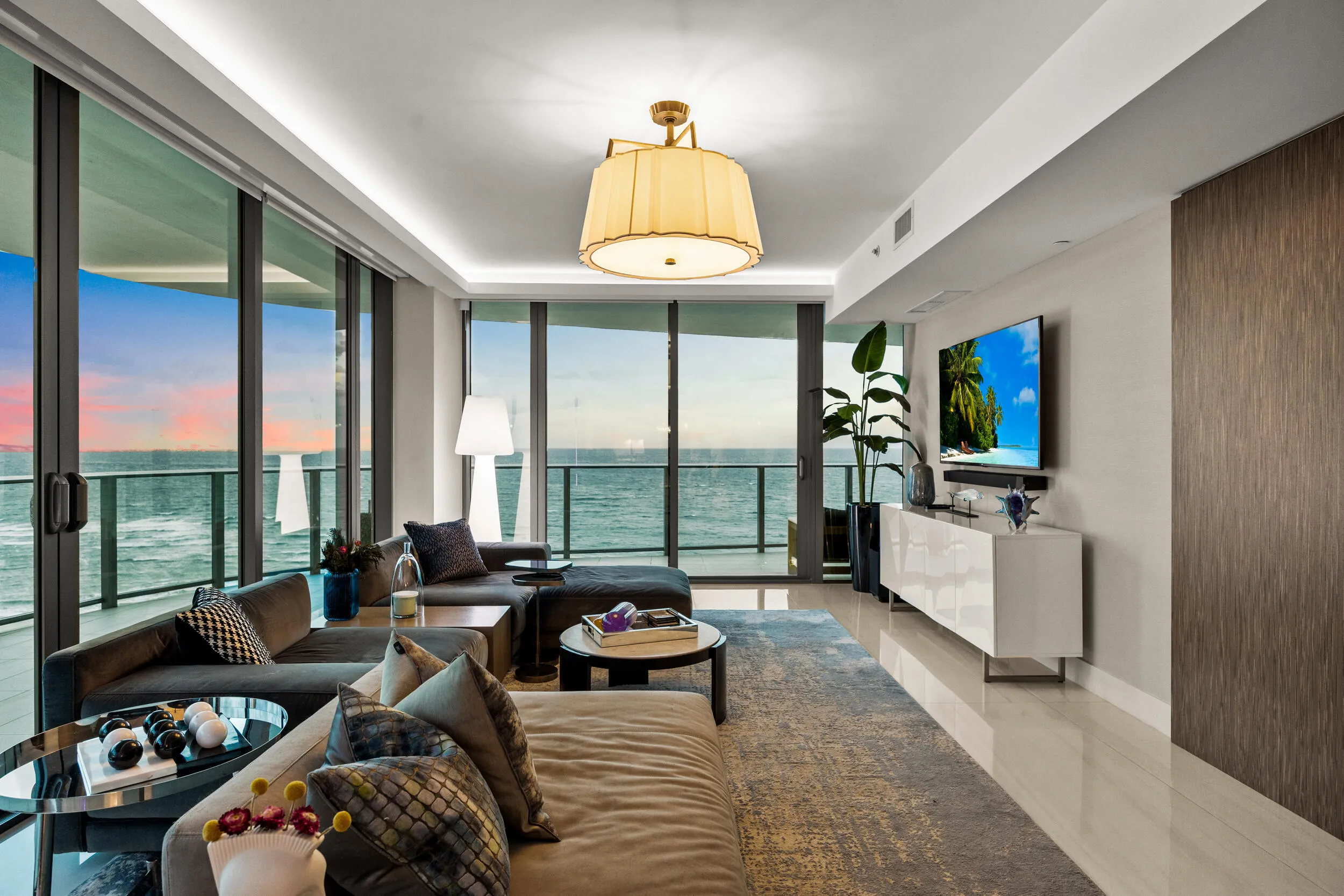 As the sun recedes into the night, the custom lighting comes alive showing why this is the most stylish condo in Pompano Beach.