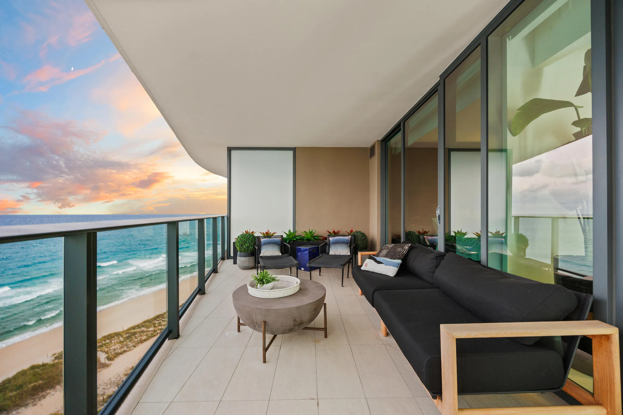 The expansive wraparound balcony offers an exceptional amount of outdoor living space and a peaceful setting to unwind with family and friends. As evening falls, enjoy colorful sunsets over the Intracoastal while the Atlantic fades into twilight and ocean breezes move gently through the air.