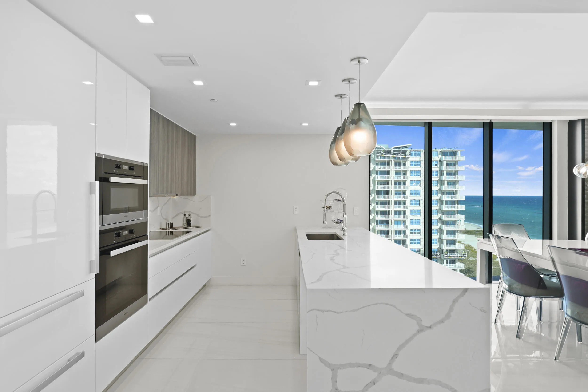 Culinary enthusiasts will enjoy a true chef's kitchen, highlighted with custom Italian cabinetry, Quartz countertops, and luxury (SubZero & Miele) appliances.