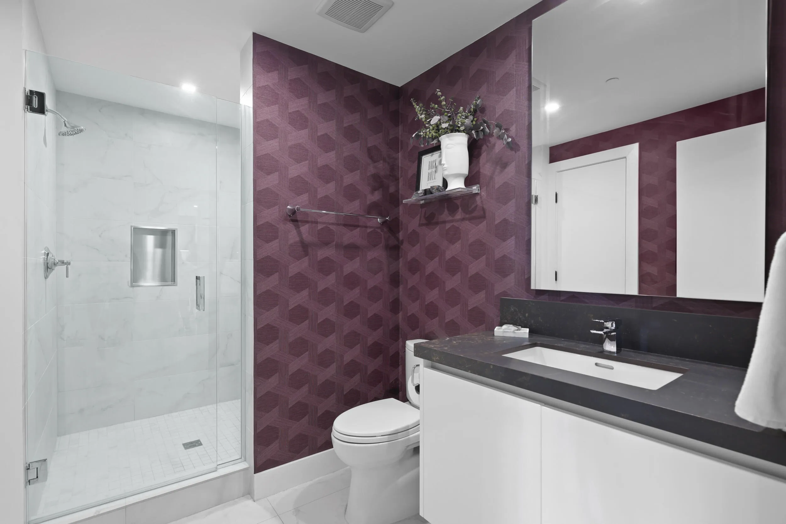 Bathroom 4 offers a designer flair with timeless elegance.