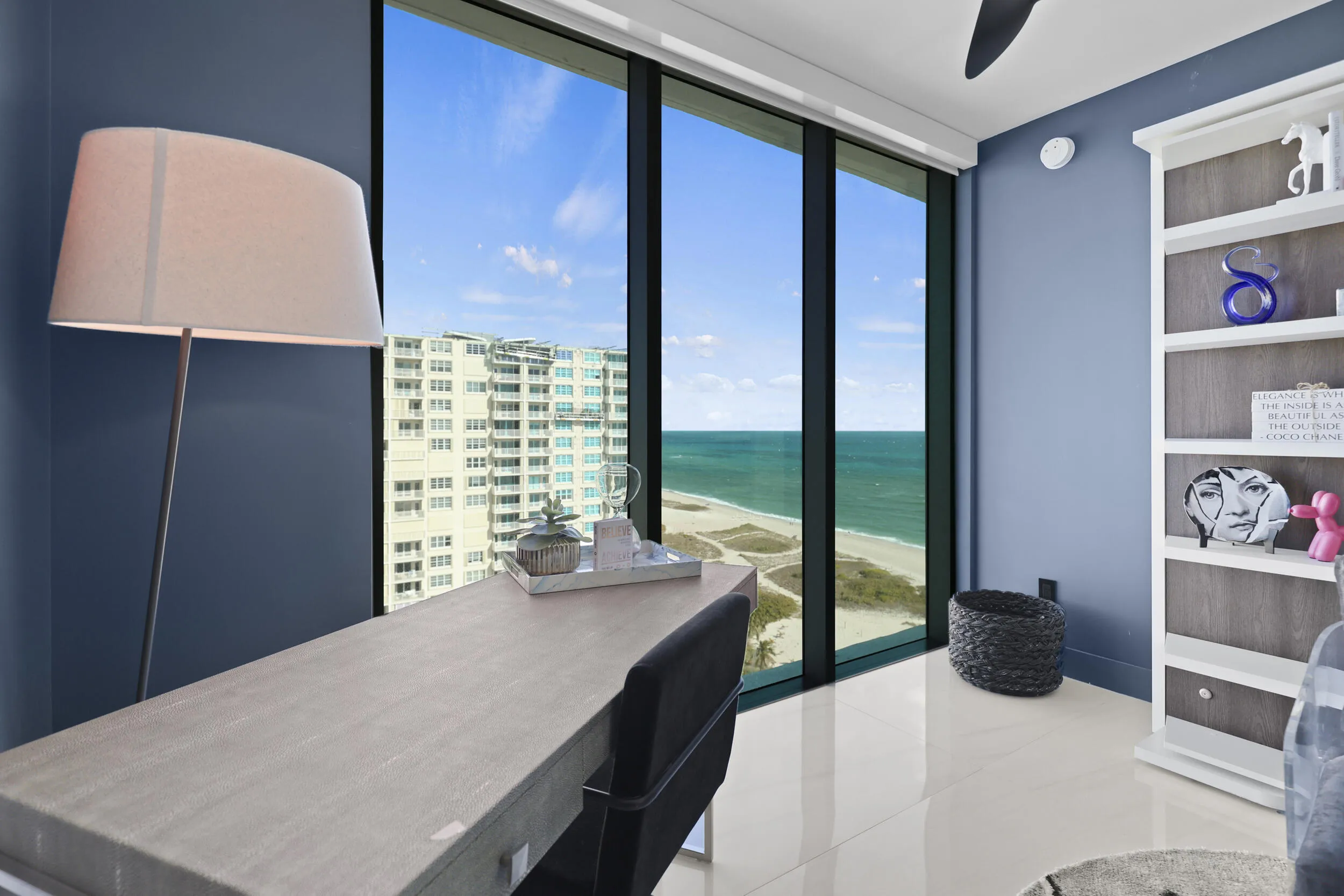 Guest bedroom 2 features more designer touches, automated blinds, customized closet, murphy bed and ensuite bathroom.