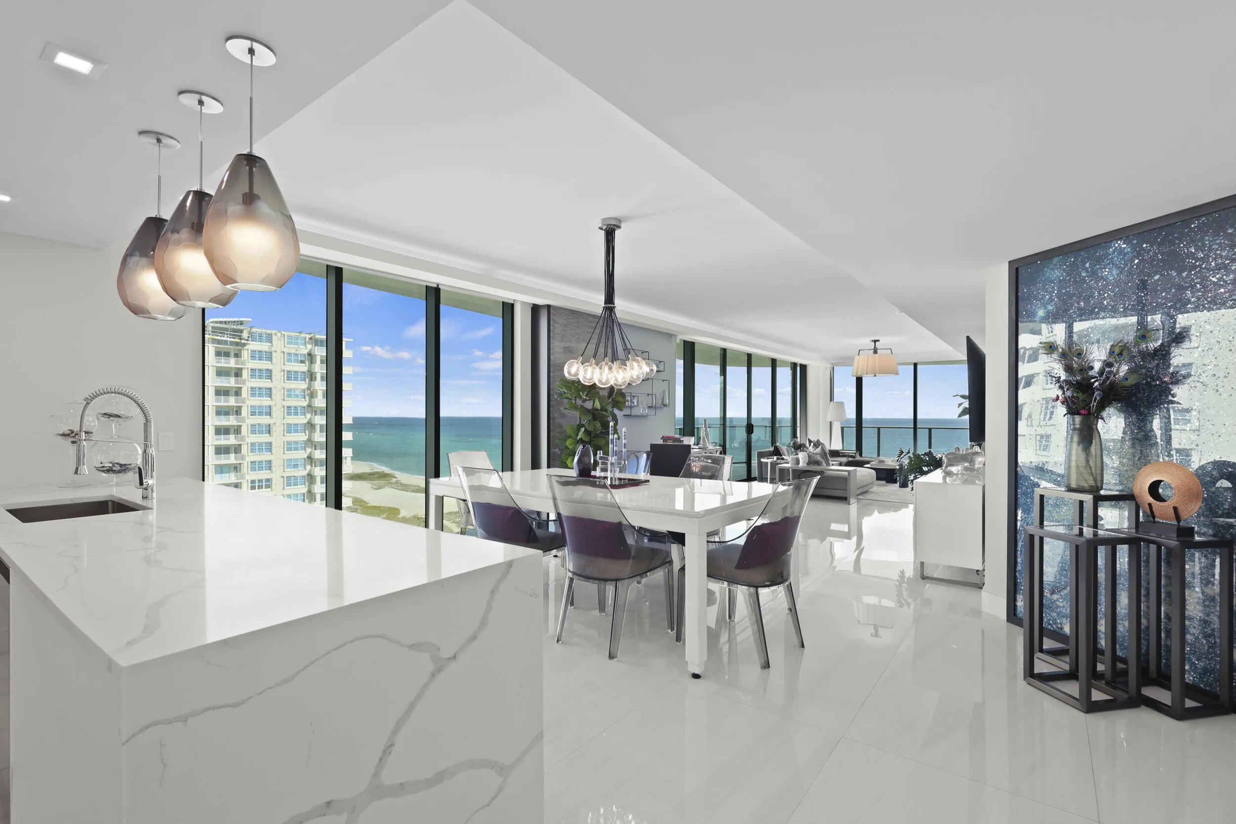 Spacious and luxurious with over 2500 sqft of air-conditioned living, 9 ft ceilings, wrap around balcony, 3 bedrooms, den/movie theatre, and 4 full bathrooms.