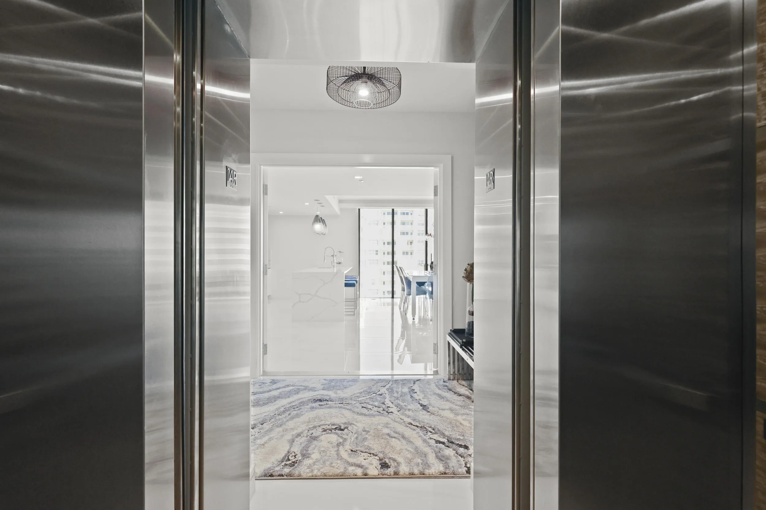 A private elevator escorts you to your 14th-floor residence overlooking the Atlantic Ocean.