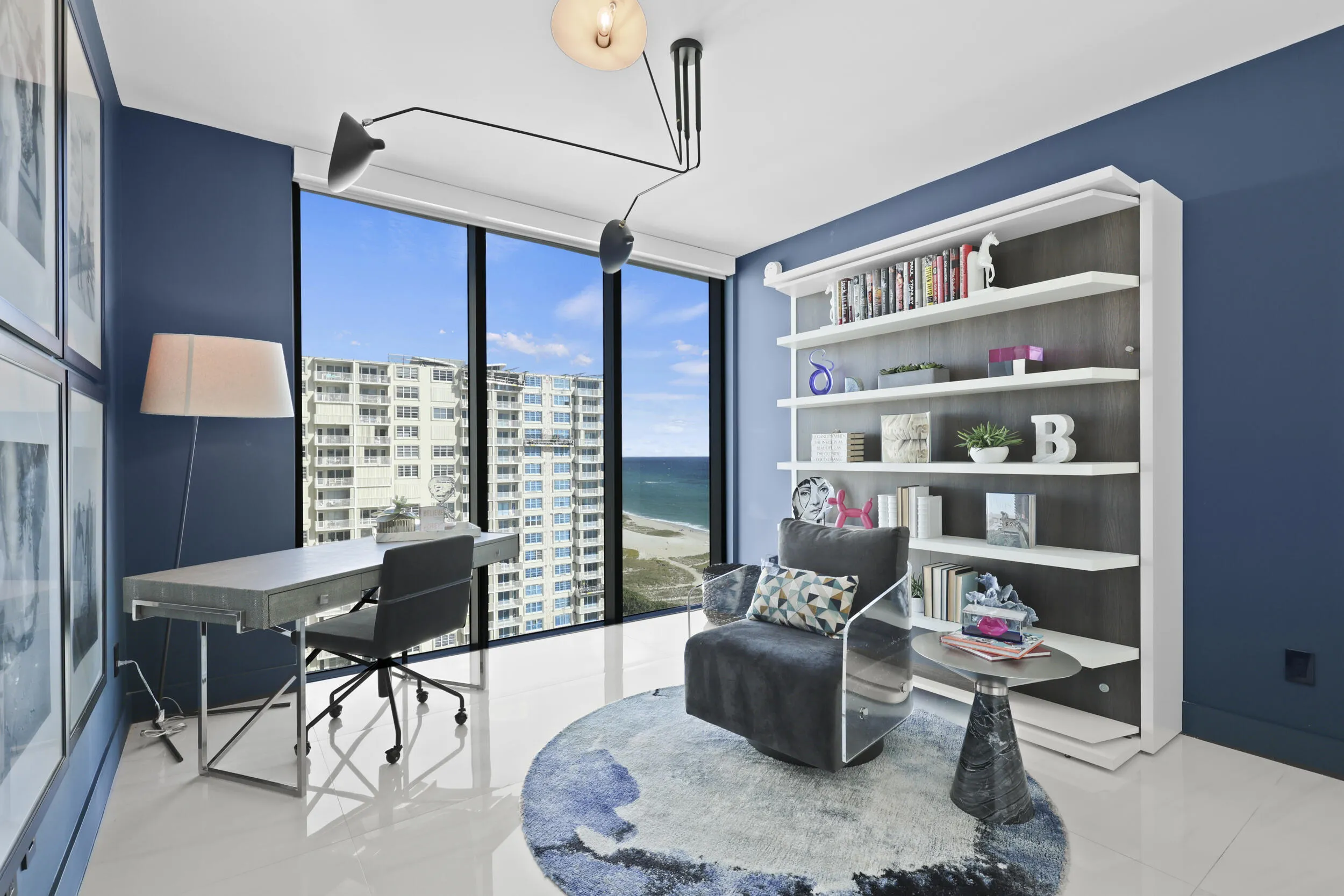 Guest bedroom 2 features more designer touches, automated blinds, customized closet, murphy bed and ensuite bathroom.