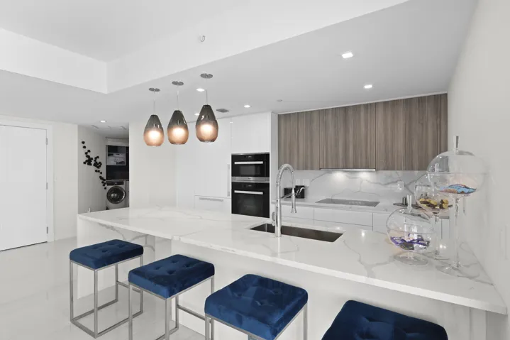 Beyond the chef's kitchen lie 2 guest bedrooms, 3 full bathrooms and a den with style that is rarely seen.
