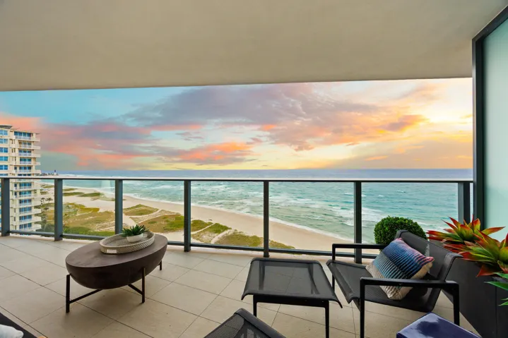 The expansive wraparound balcony offers an exceptional amount of outdoor living space and a peaceful setting to unwind with family and friends. As evening falls, enjoy colorful sunsets over the Intracoastal while the Atlantic fades into twilight and ocean breezes move gently through the air.