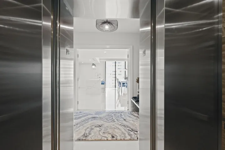 A private elevator escorts you to your 14th-floor residence overlooking the Atlantic Ocean.