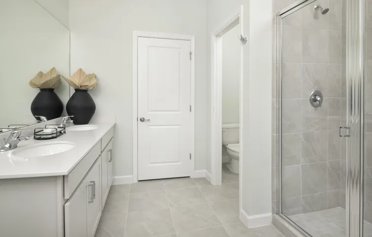 Stock photos represent builder's floorplan