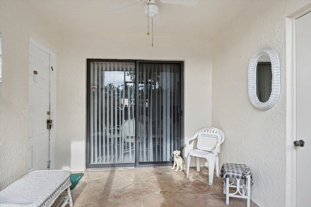 PRIVATE FRONT PATIO WITH STORAGE ROOM