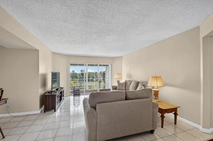 Living area with tile flooring and neutral wall tones
