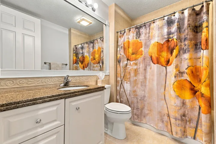 Guest bath with framed mirror