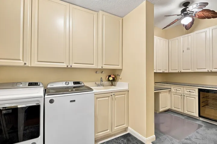 Laundry room with sink and lots of cabinet space