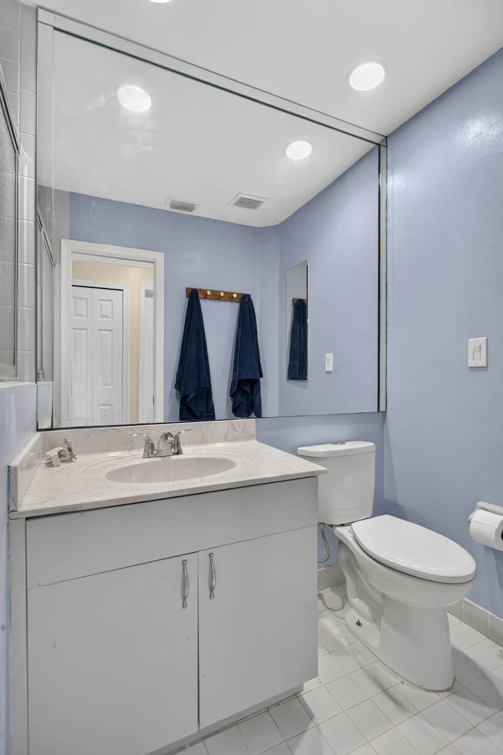 Second Bathroom. View looking from entry towards sink and toilet.