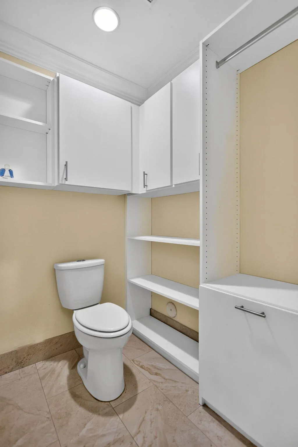 Main bath side toilet room. View from separating pocket door'