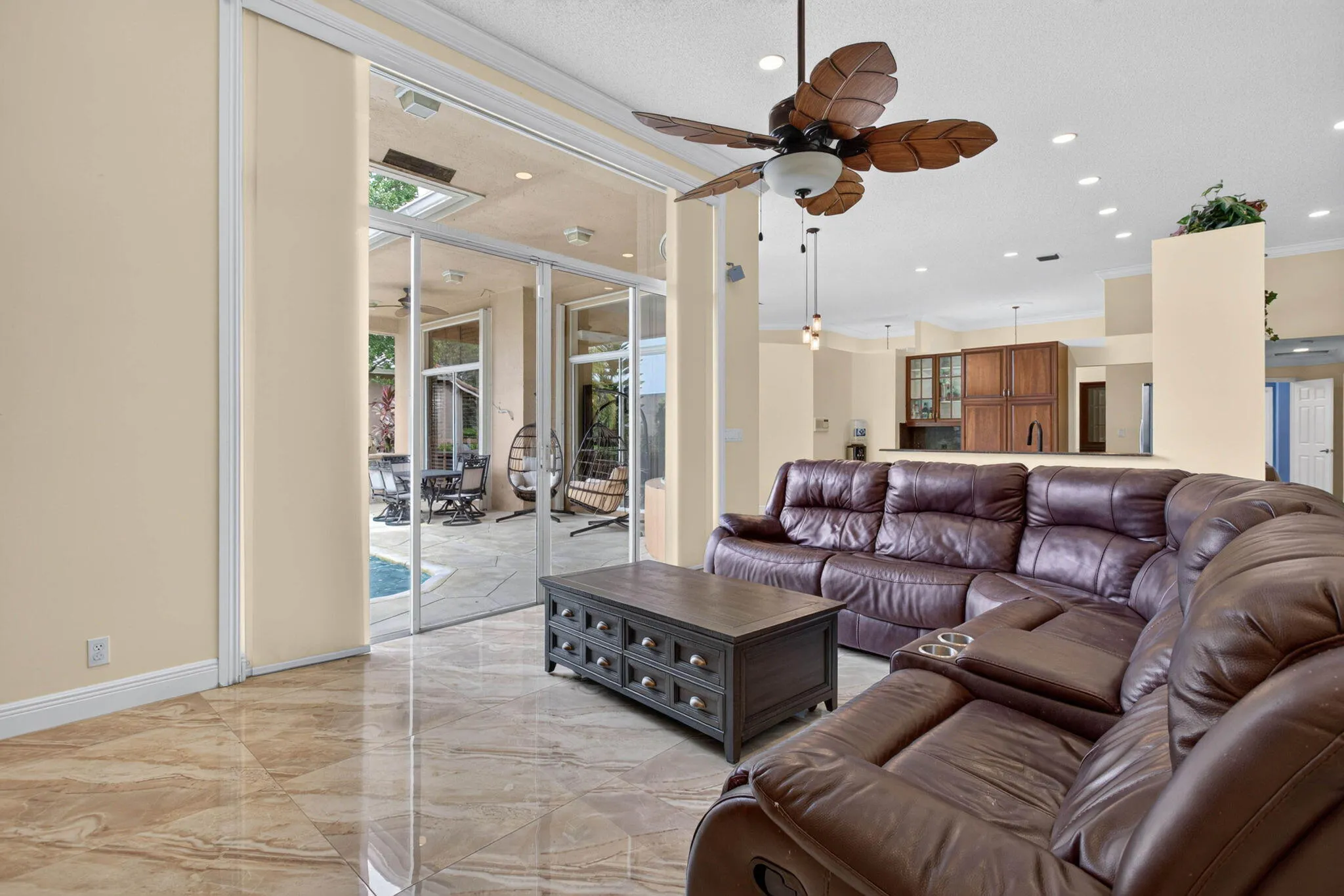 Livingroom. View from Fifth bedroom entrance towards pool deck sliding door.