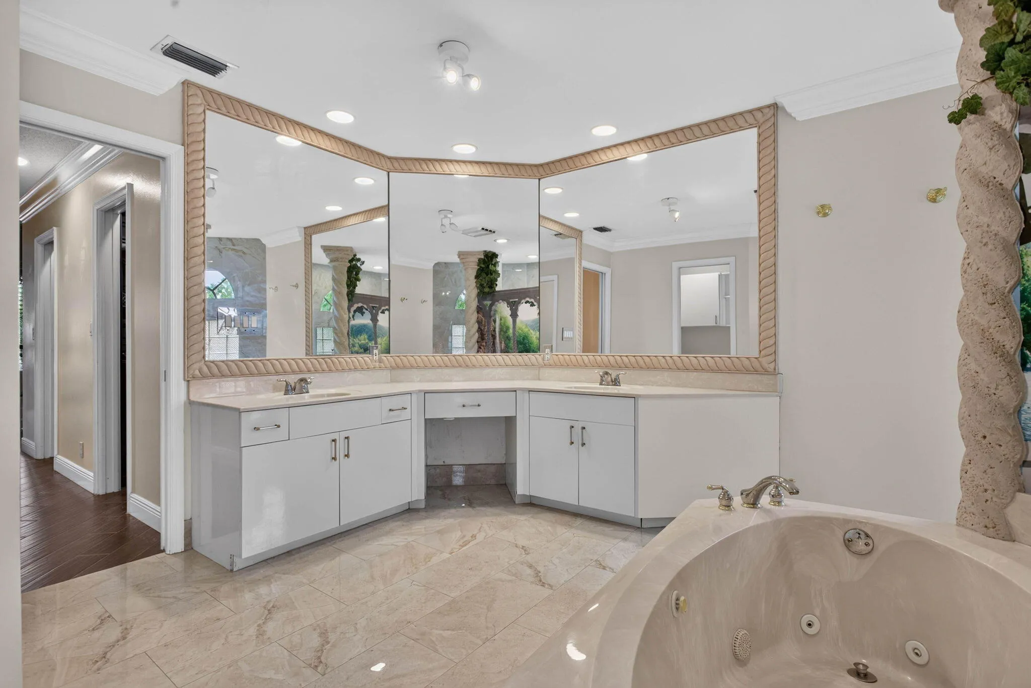Main room bath. View looking from wraparound shower towards the room entrance'
