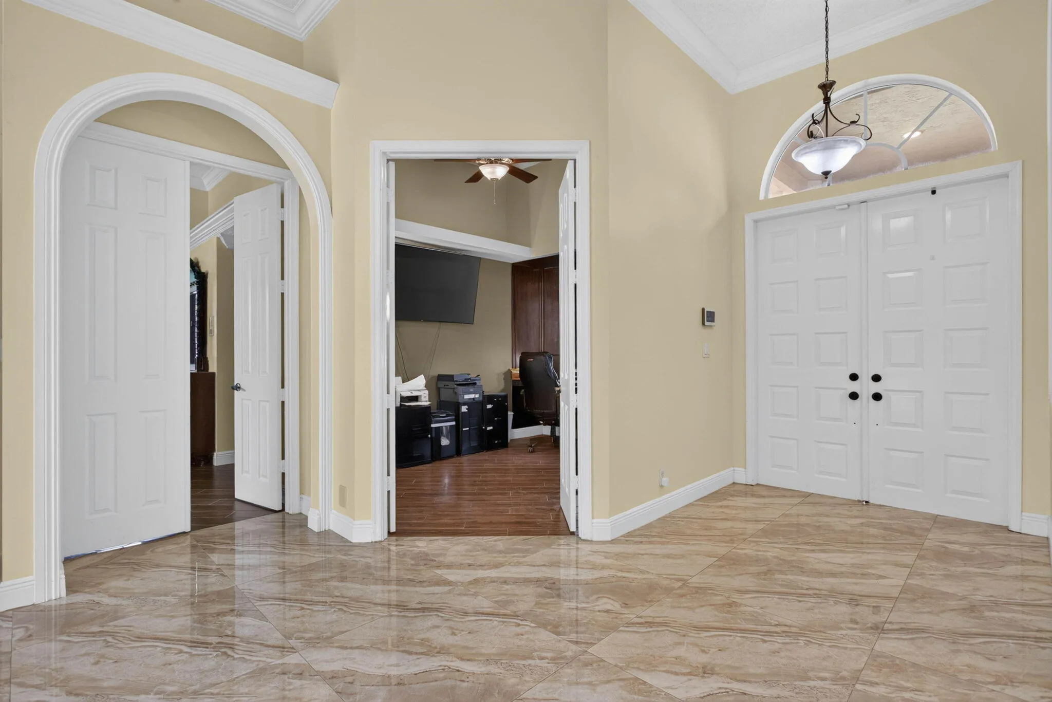 Foyer and entrance to office/den and Main bedroom.