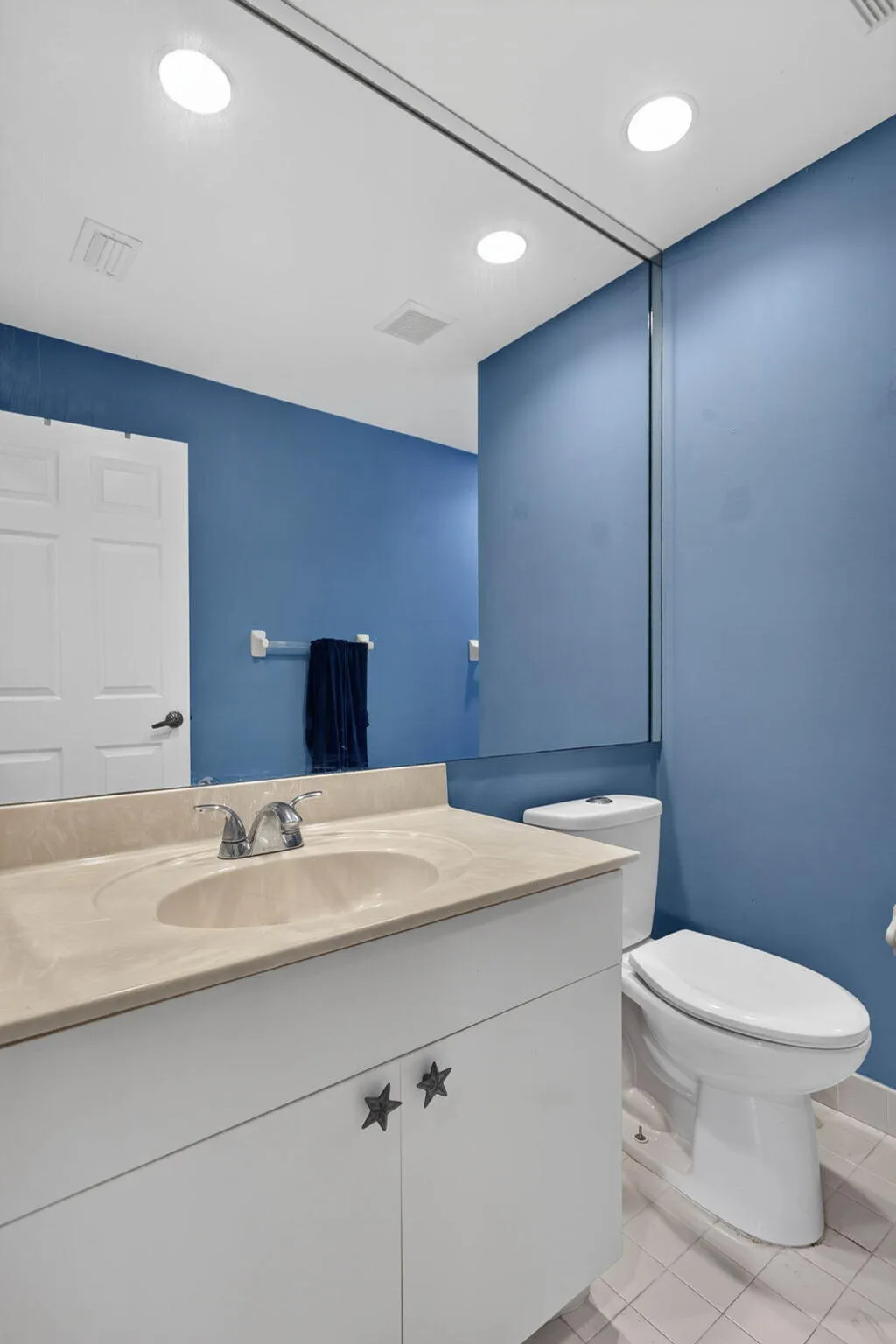 Fifth bedroom cabana bath. View from Door towards sink and toilet.