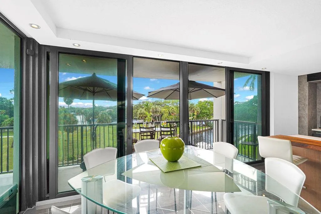 Dining area with sliding glass doors to balcony