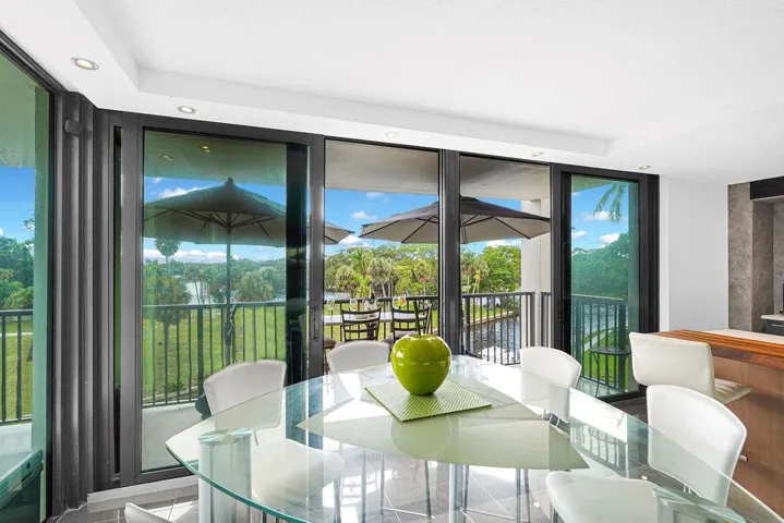 Dining area with sliding glass doors to balcony