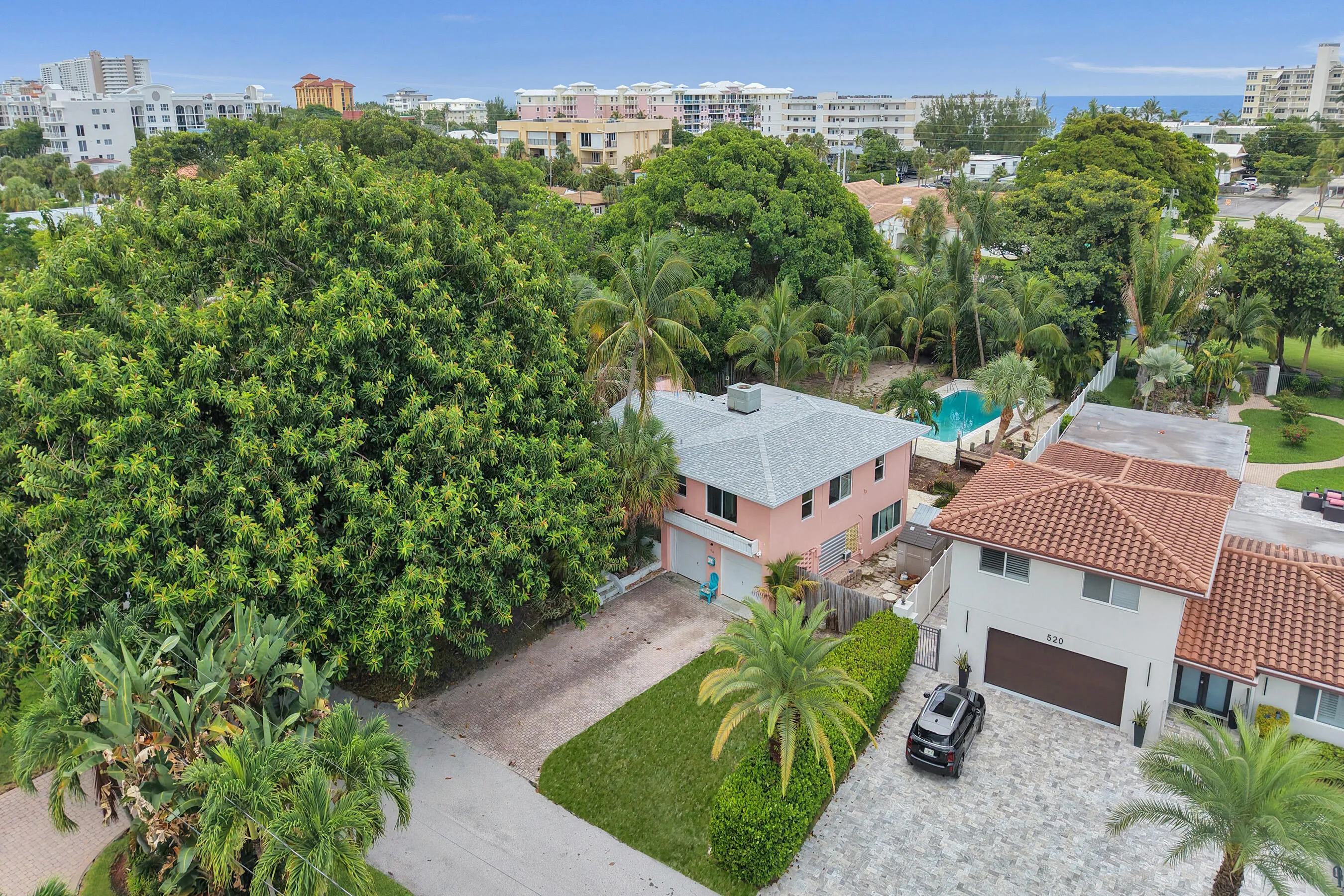 Freshly cleared 14,544 SF parcel with existing residence and full-size pool