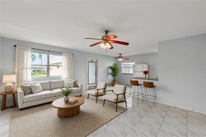 Virtual Staging: Quaint living room/dining room with ample space for full furniture amenities