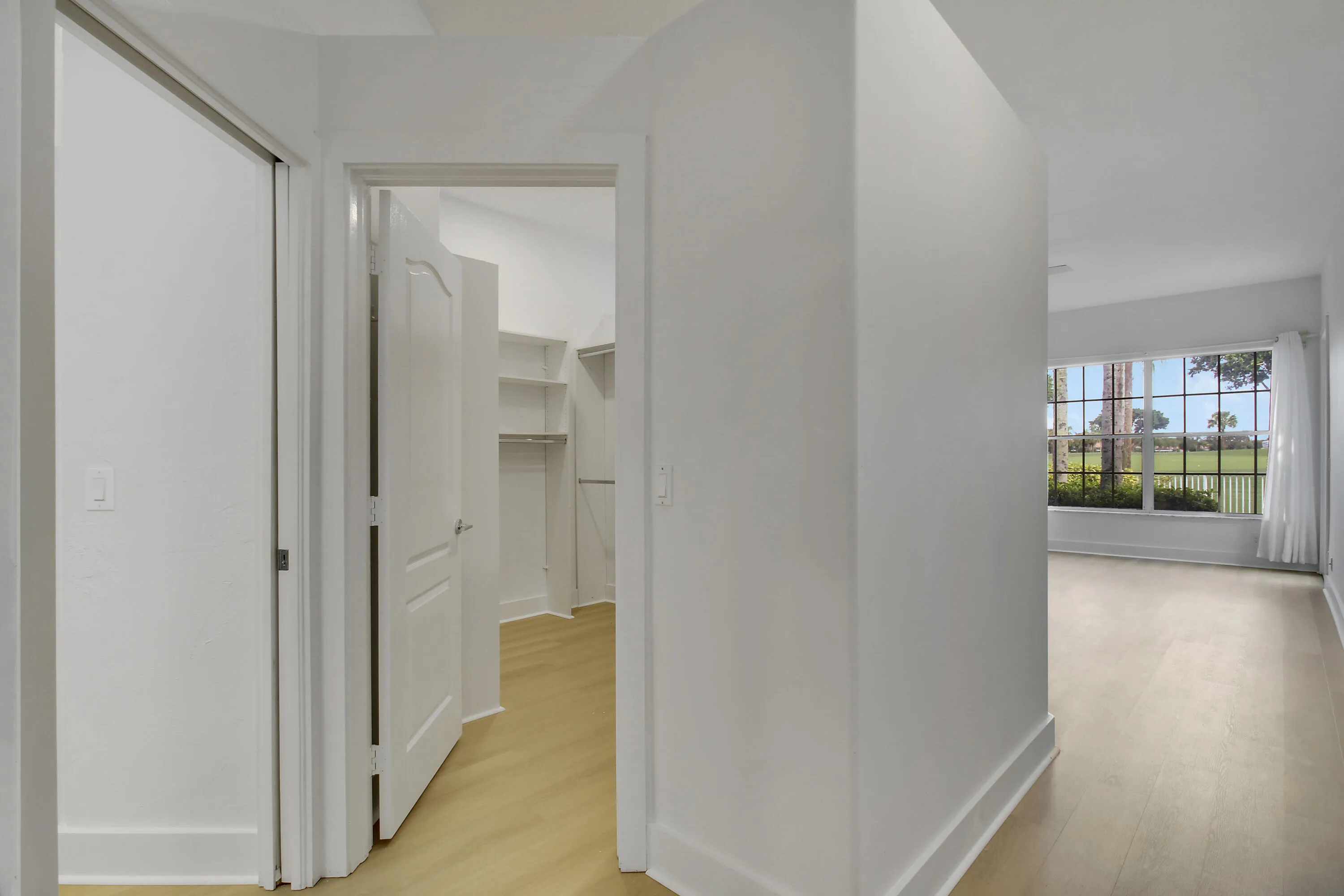 Primary Closet to Bedroom View