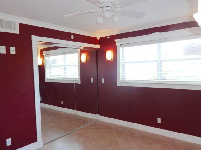 Guest bedroom mirrored closet doors!
