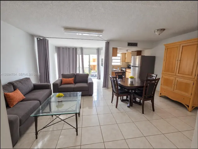 entry level has 1/2 bath and bonus space by the windows, enclosable for office or bed
