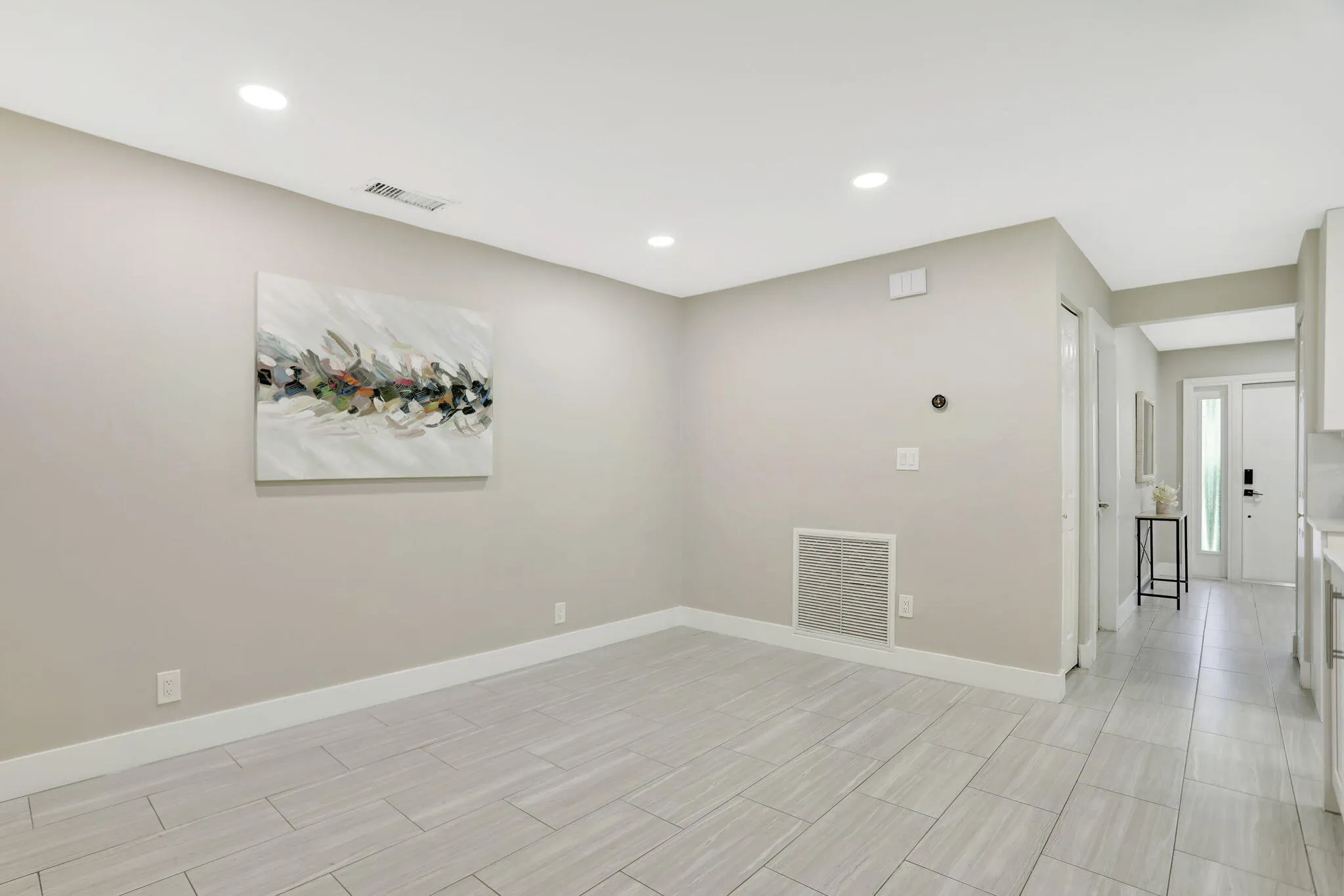 Versatile flex space off the kitchen—ideal for a home office, reading area or additional gathering space