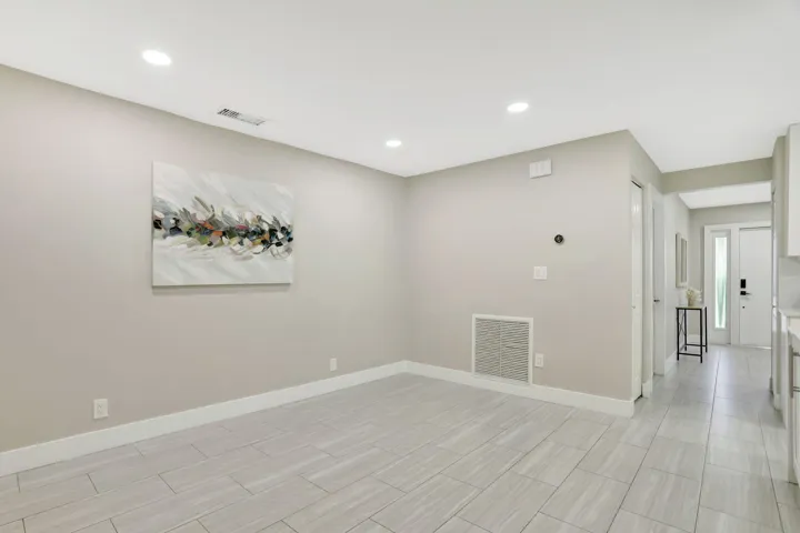 Versatile flex space off the kitchen—ideal for a home office, reading area or additional gathering space