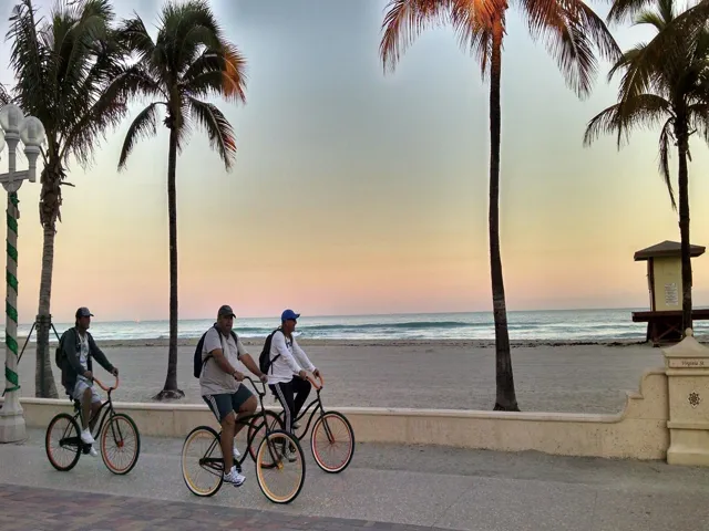 MEN BIKERS ON THE BROADWALK