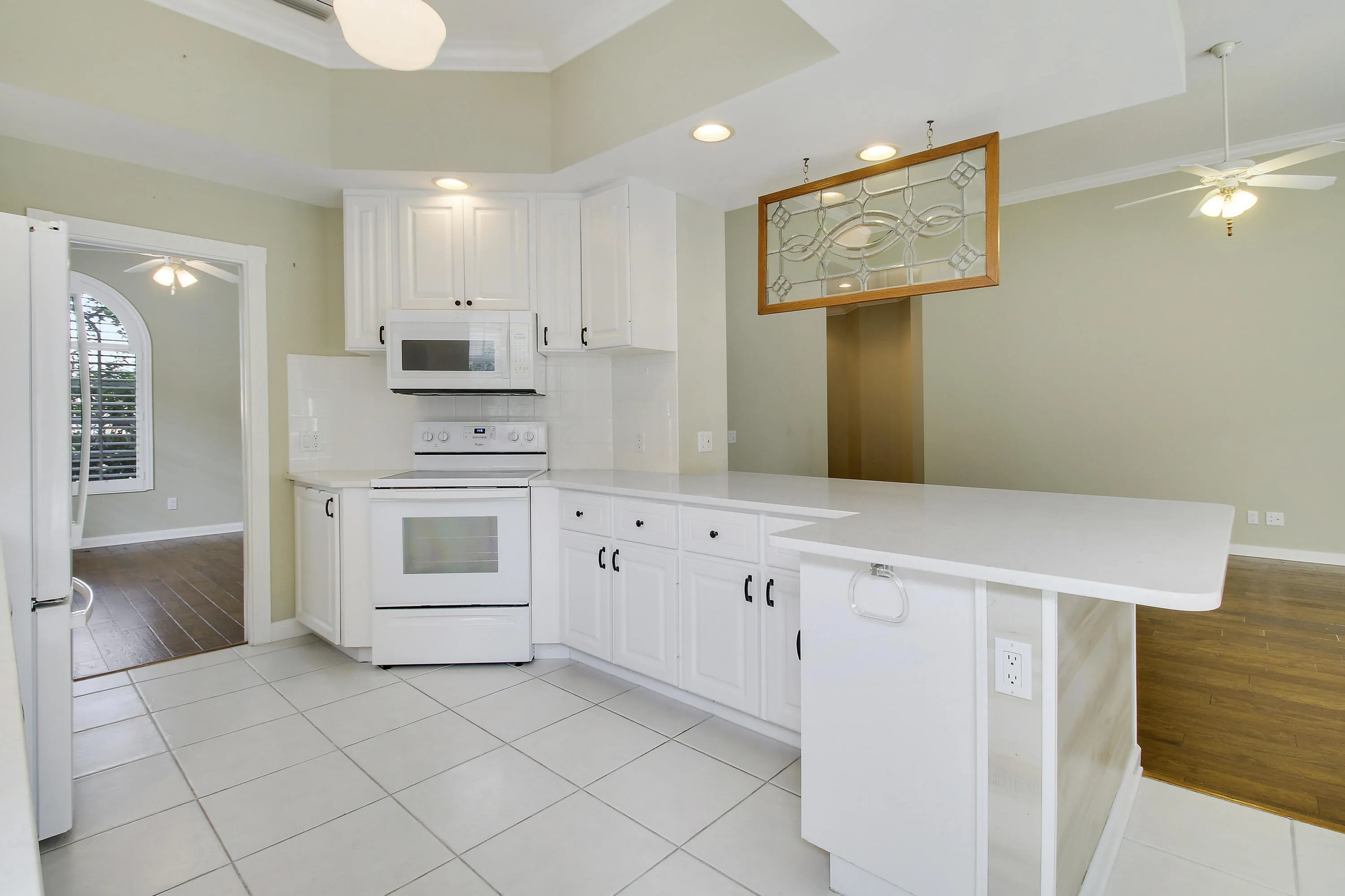 Kitchen Looking toward Den on Left