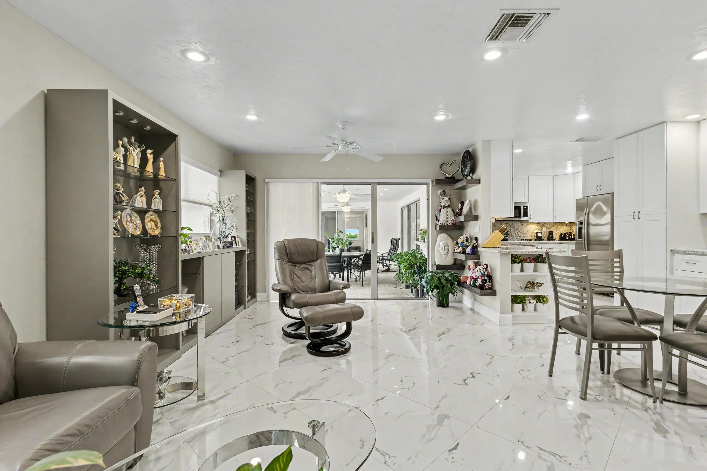 Family room with access to patio and pool.