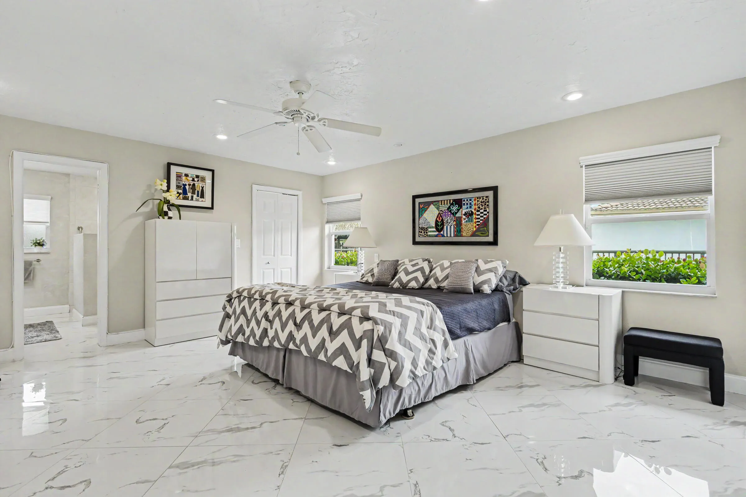 Primary bedroom with multiple closets