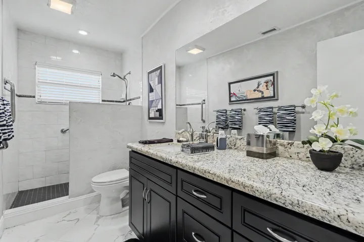Guest bathroom with step in shower