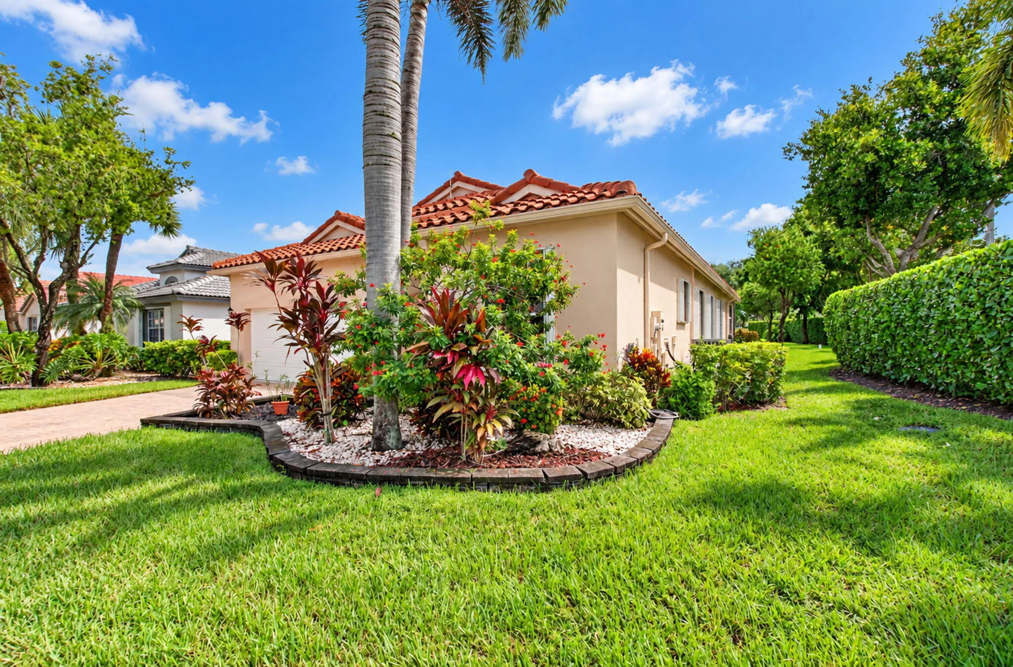 LUSHLY LANDSCAPED CORNER LOT