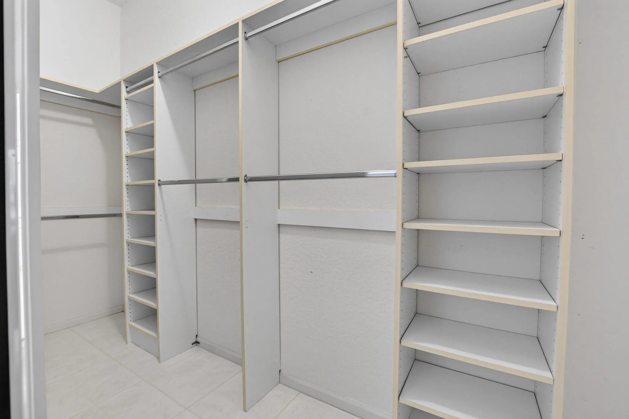 ONE OF TWO CUSTOM FITTED CLOSETS