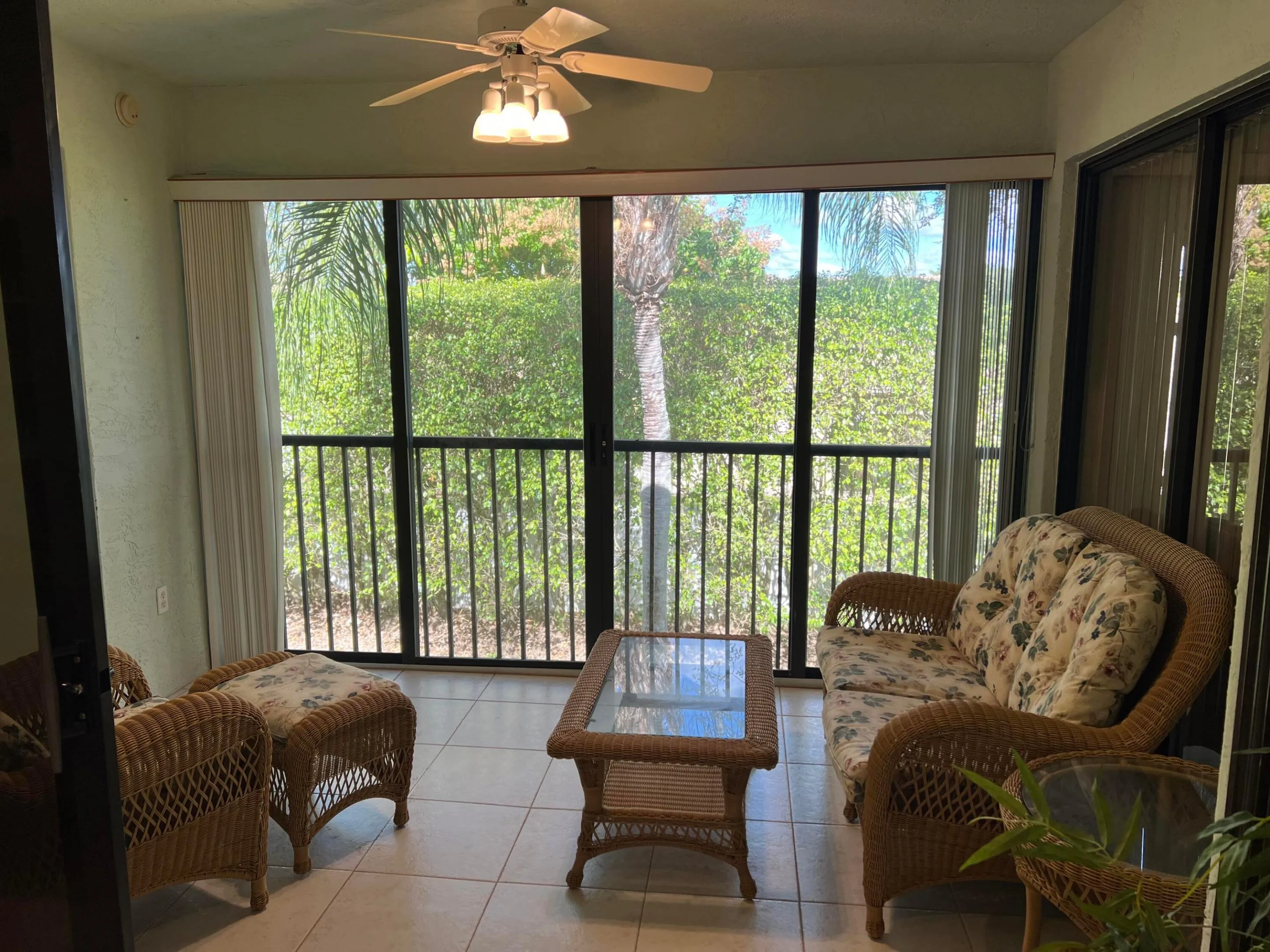 Air conditioned balcony with sliders and storage closet. There is a smaller screened in balcony off the kitchen as well