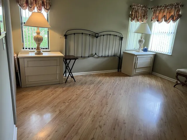 Large master bedroom with corner windows making it very light and bright!