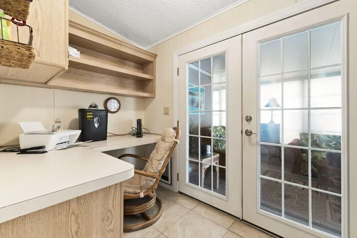 OFFICE W/FRENCH DOORS TO FLORIDA ROOM