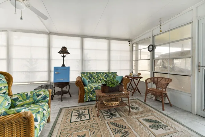 FLORIDA ROOM WITH SIDE ENTRANCE TO HOME
