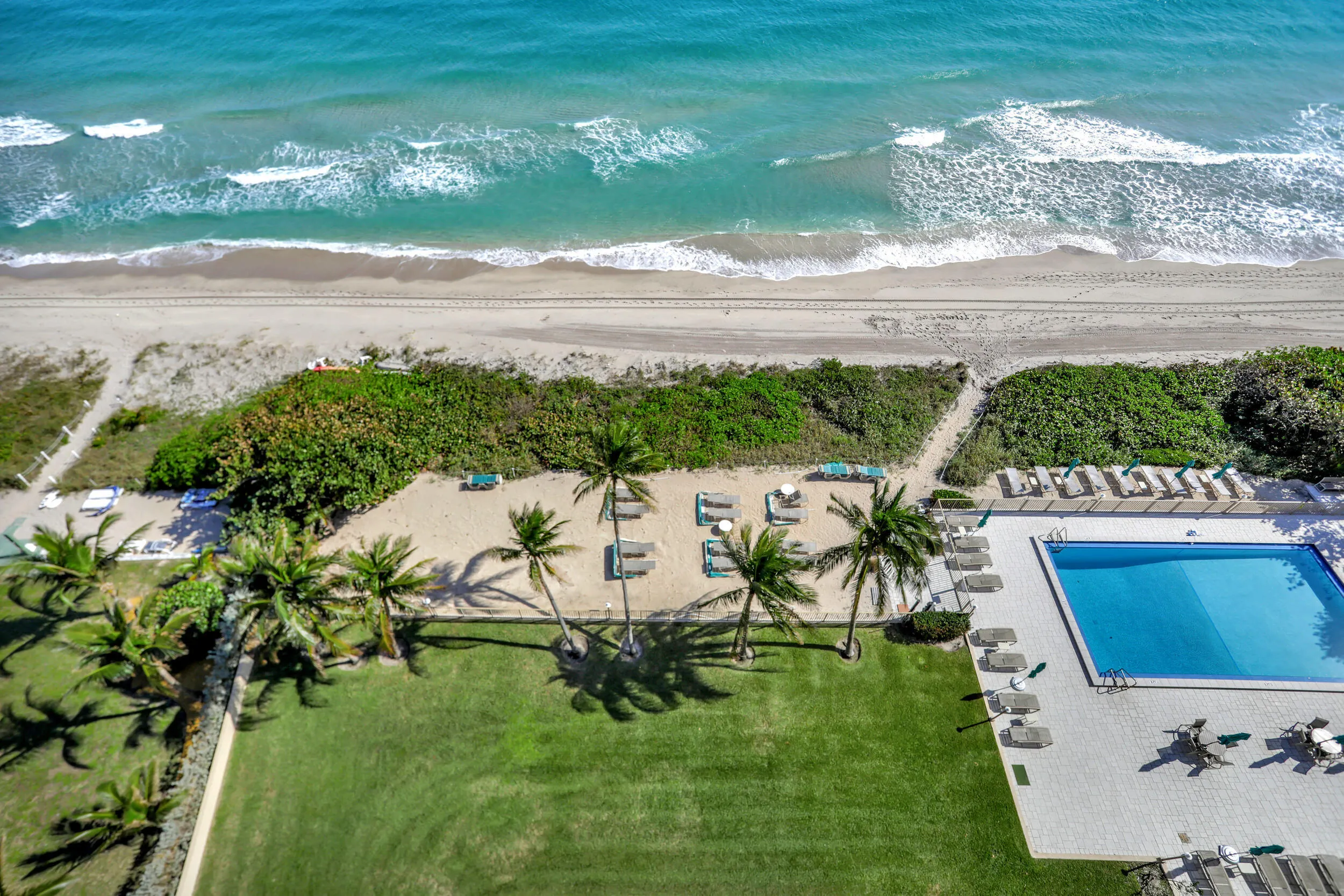 Private beach area and green space to play.