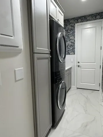 Laundry Room with stackable Washer/Dryer