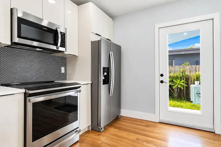 impact door to yard from kitchen