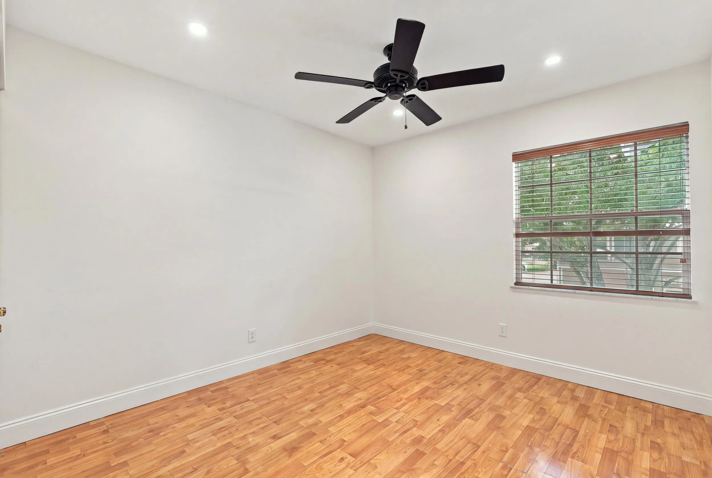 Both upstairs guest bedrooms are generously sized and filled with natural light, offering ample closet space and comfortable accommodations for family, overnight guests, or a growing household.